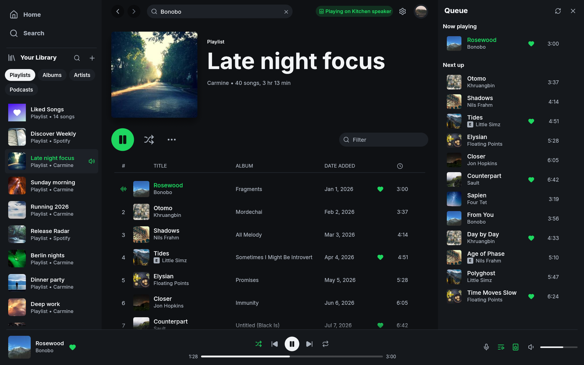 Woofer showing a playlist, the currently playing track, and the queue in one desktop window.